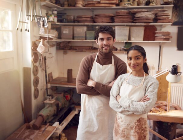 portrait-of-couple-running-bespoke-pottery-busines-2023-11-27-05-06-46-utc